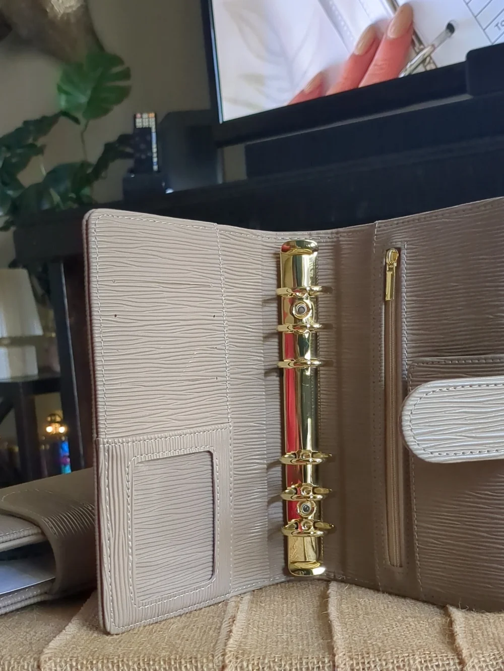 Taupe Textured Saffiano Binder With Gold Hardware.